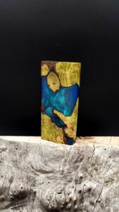 This image portrays Case for Dynavap - Cottonwood/Resin Hybrid/Luminescent by Dovetail Woodwork.