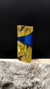 This image portrays Case for Dynavap - Cottonwood/Resin Hybrid/Luminescent by Dovetail Woodwork.