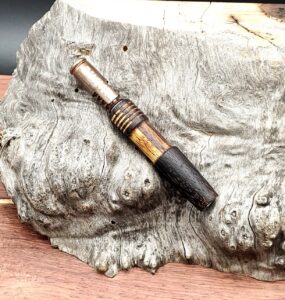 This image portrays Dynavap Midsection - Flame Torched by Dovetail Woodwork.