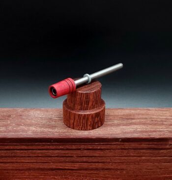 This image portrays Dynavap Spinning Mouthpiece-Redheart Wood by Dovetail Woodwork.