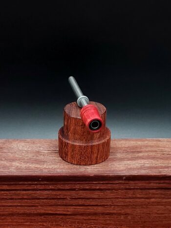 This image portrays Dynavap Spinning Mouthpiece-Redheart Wood by Dovetail Woodwork.