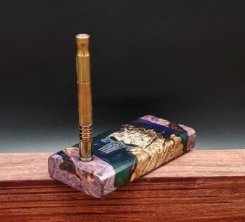 This image portrays ☠Flaming Skull Dynavap Case/Stash-Spalted Maple Burl Hybrid☠ by Dovetail Woodwork.