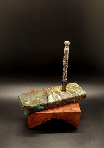 This image portrays Cosmic Burl-Live Edge-XL Dynavap Stash Case by Dovetail Woodwork.