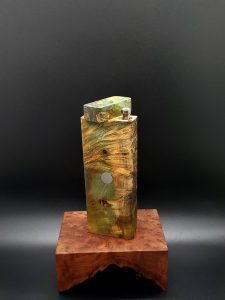 This image portrays Cosmic Burl XL Dynavap Stash Case by Dovetail Woodwork.
