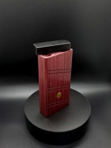 This image portrays 2G-XL Stash-Purpleheart/Ebony Wood-Dynavap Case by Dovetail Woodwork.