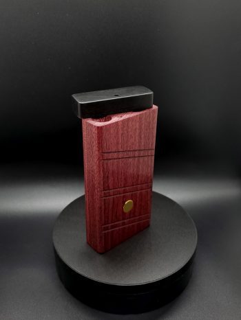 This image portrays 2G-XL Stash-Purpleheart/Ebony Wood-Dynavap Case by Dovetail Woodwork.