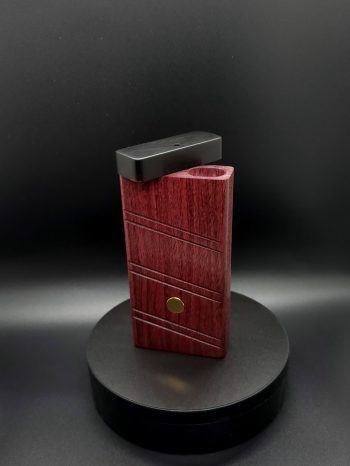 This image portrays 2G-XL Stash-Purpleheart/Ebony Wood-Dynavap Case by Dovetail Woodwork.