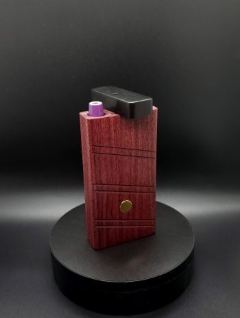 This image portrays 2G-XL Stash-Purpleheart/Ebony Wood-Dynavap Case by Dovetail Woodwork.