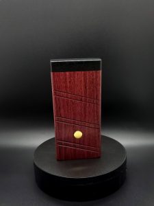 This image portrays 2G-XL Stash-Purpleheart/Ebony Wood-Dynavap Case by Dovetail Woodwork.