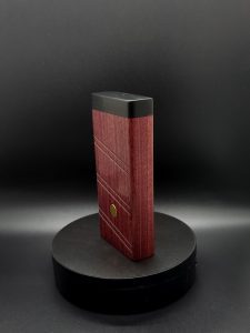 This image portrays 2G-XL Stash-Purpleheart/Ebony Wood-Dynavap Case by Dovetail Woodwork.