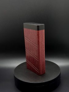 This image portrays 2G-XL Stash-Purpleheart/Ebony Wood-Dynavap Case by Dovetail Woodwork.