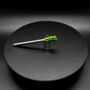 This image portrays Dynavap Spinning Mouthpiece-Dovetail Green/Black by Dovetail Woodwork.