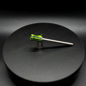 This image portrays Dynavap Spinning Mouthpiece-Dovetail Green/Black by Dovetail Woodwork.