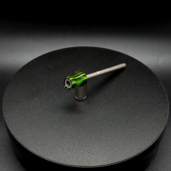 This image portrays Dynavap Spinning Mouthpiece-Dovetail Green/Black by Dovetail Woodwork.