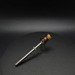 This image portrays Luminescent Hybrid Dynavap Spinning Mouthpiece by Dovetail Woodwork.