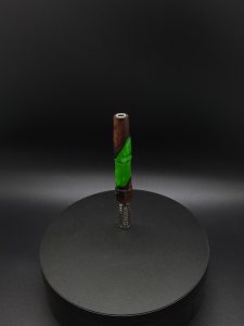 This image portrays Twisted Series-Cosmic Green Hybrid-XL Dynavap Stem by Dovetail Woodwork.