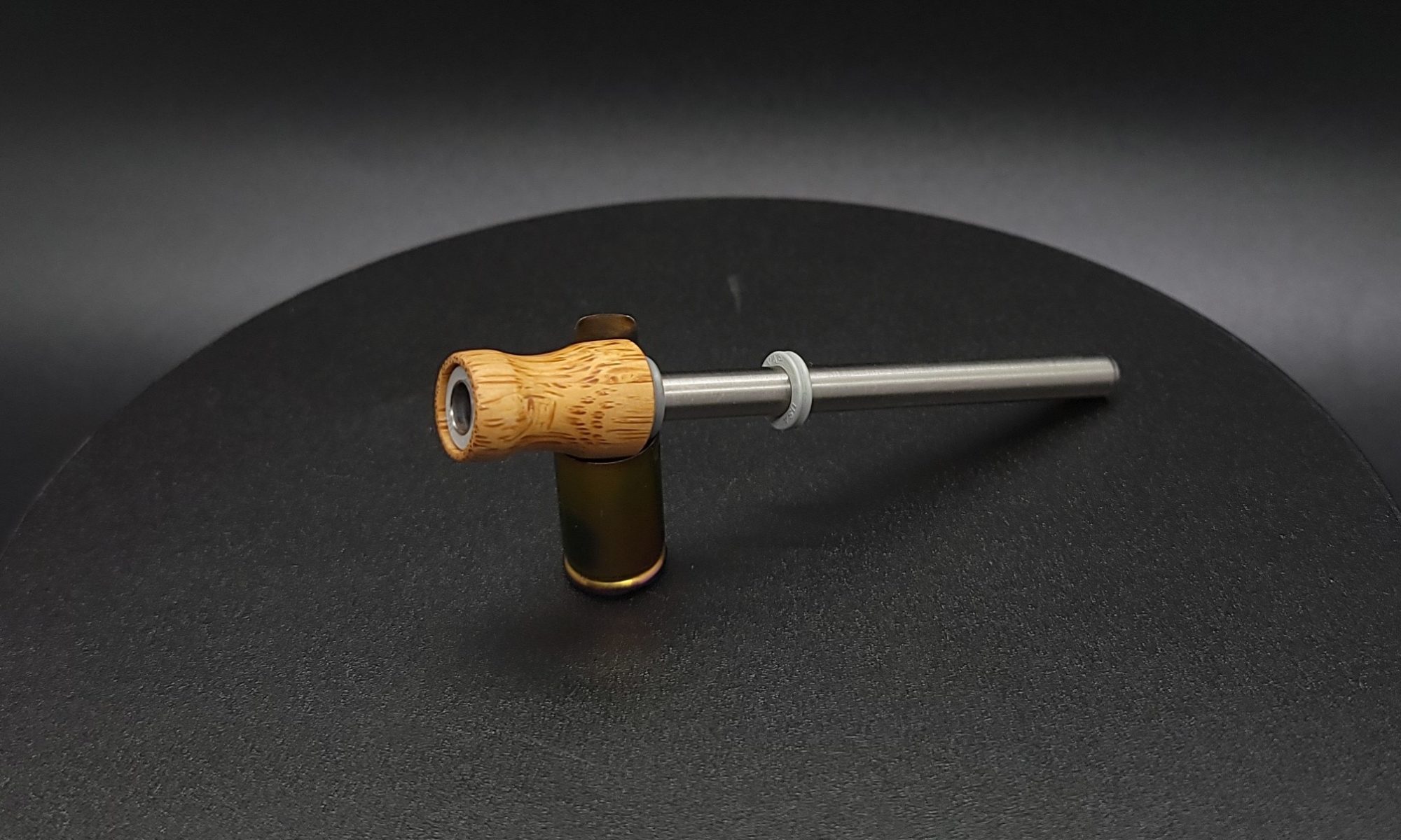 This image portrays Dynavap Spinning Mouthpiece-Durable Bamboo by Dovetail Woodwork.