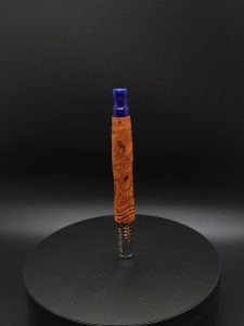 This image portrays River Stem-Exhibition Grade Amboyna Burl-XL Dynavap Stem by Dovetail Woodwork.