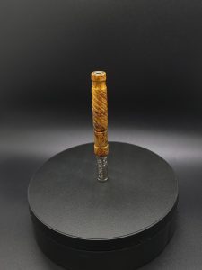 This image portrays Straight Cut XL-Maple Burl/Gold Anodized Titanium-Dynavap Stem by Dovetail Woodwork.