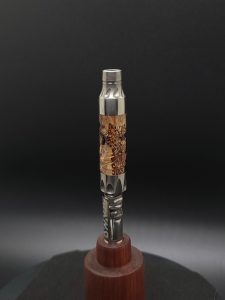 This image portrays Vong(i) Custom Sleeve-Black Walnut Burl Hybrid by Dovetail Woodwork.