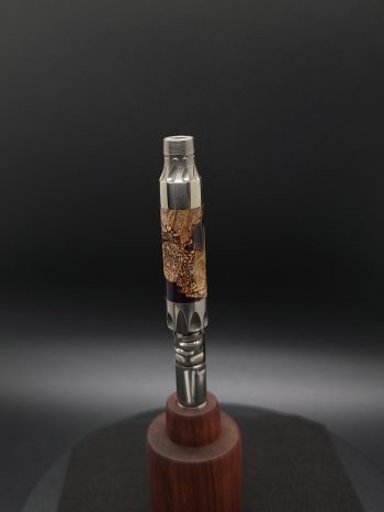 This image portrays Vong(i) Custom Sleeve-Black Walnut Burl Hybrid by Dovetail Woodwork.