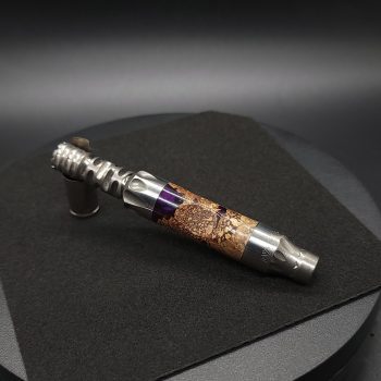 This image portrays Vong(i) Custom Sleeve-Black Walnut Burl Hybrid by Dovetail Woodwork.