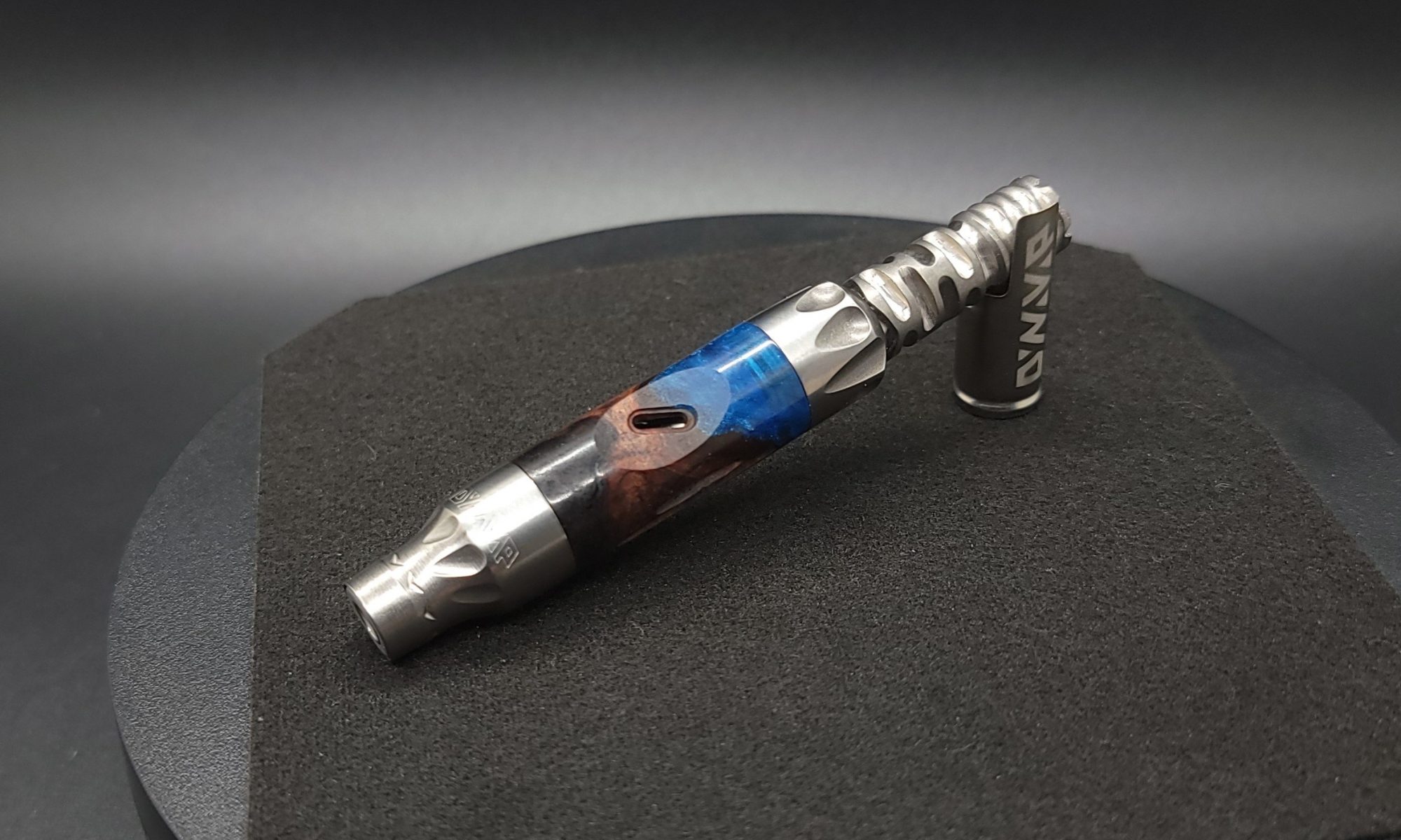 This image portrays Vong(i) Custom Sleeve-California Redwood Burl Hybrid by Dovetail Woodwork.