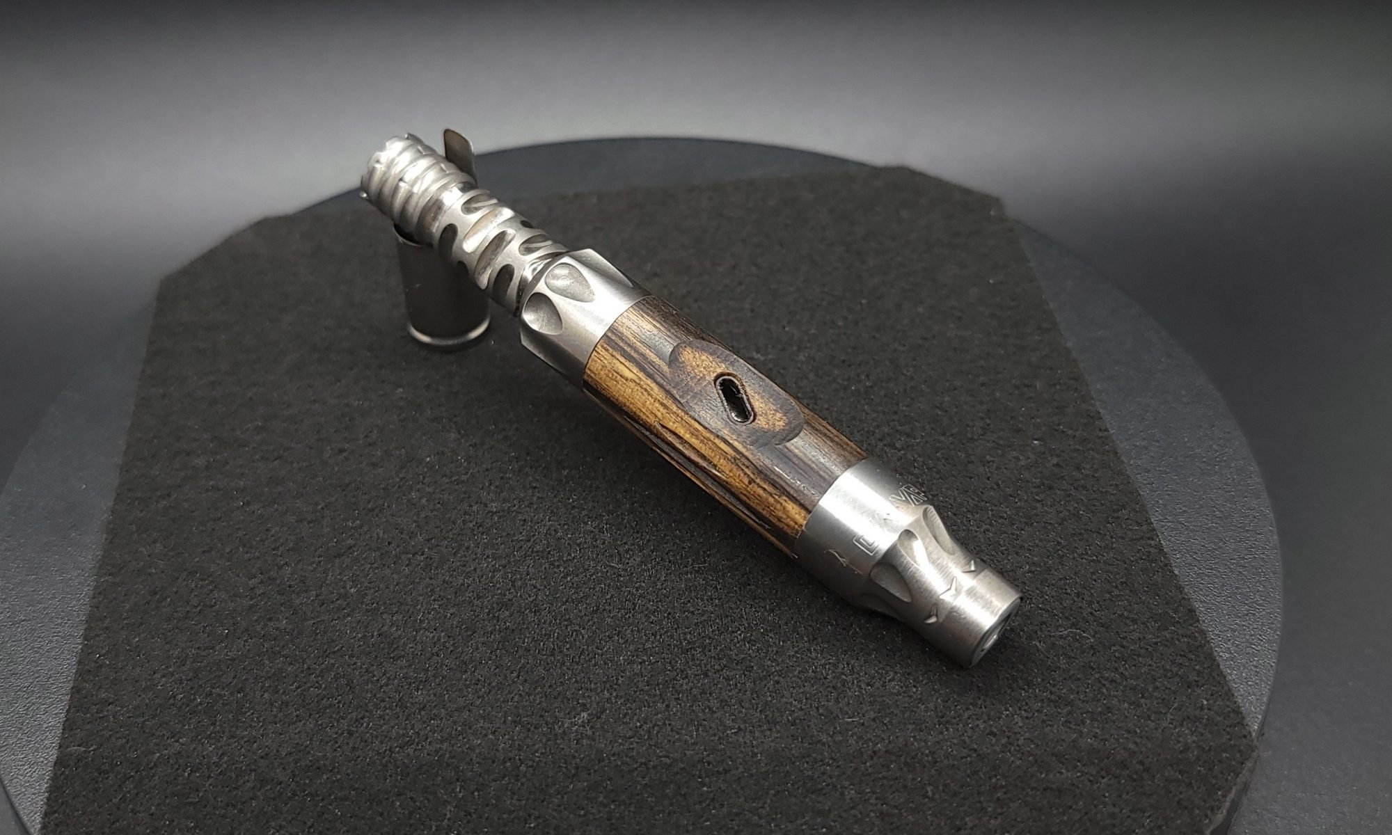 This image portrays Vong(i) Custom Sleeve-Black & White Ebony Wood Sleeve by Dovetail Woodwork.