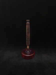 This image portrays High Class-Knurled XL Dynavap Stem/Claro Walnut Burl with Matching Mouthpiece by Dovetail Woodwork.
