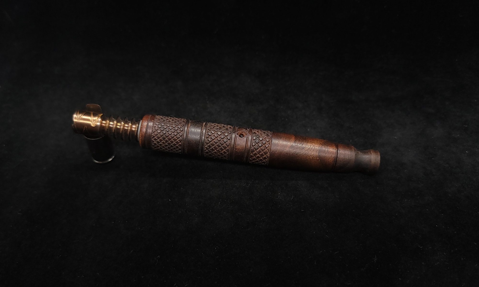 This image portrays High Class-Knurled XL Dynavap Stem/Claro Walnut Burl with Matching Mouthpiece by Dovetail Woodwork.