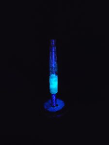 This image portrays High Class-Knurled XL Dynavap Stem/Luminescent Burl Hybrid + Matching M.P. by Dovetail Woodwork.