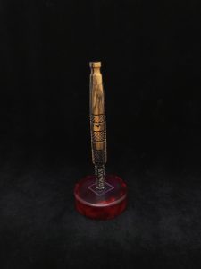 This image portrays High Class-Knurled XL Dynavap Stem/Black & White Ebony with Matching Mouthpiece by Dovetail Woodwork.