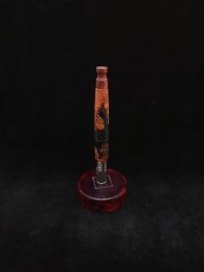 This image portrays High Class-Knurled XL Dynavap Stem/Manzanita Burl Hybrid + Matching Mouthpiece by Dovetail Woodwork.