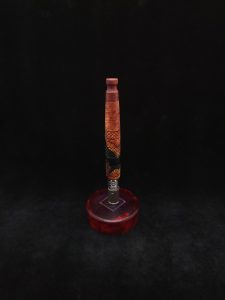 This image portrays High Class-Knurled XL Dynavap Stem/Manzanita Burl Hybrid + Matching Mouthpiece by Dovetail Woodwork.