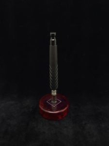 This image portrays Reaper XL Dynavap Stem/Matte Ebony Wood + Gloss Black Mouthpiece by Dovetail Woodwork.
