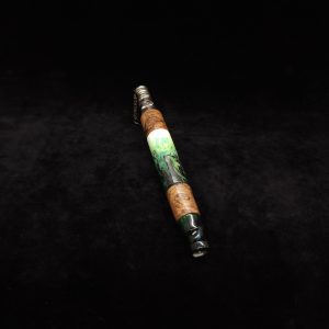 This image portrays Luminescent Widow Dynavap Stem XL-Hybrid + M.P. by Dovetail Woodwork.