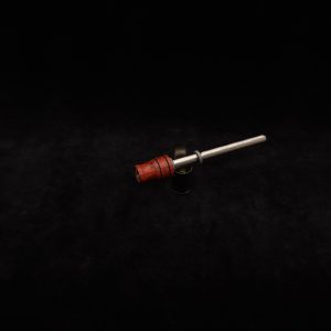 This image portrays Dynavap Spinning Mouthpiece-Specialty Bloodwood by Dovetail Woodwork.