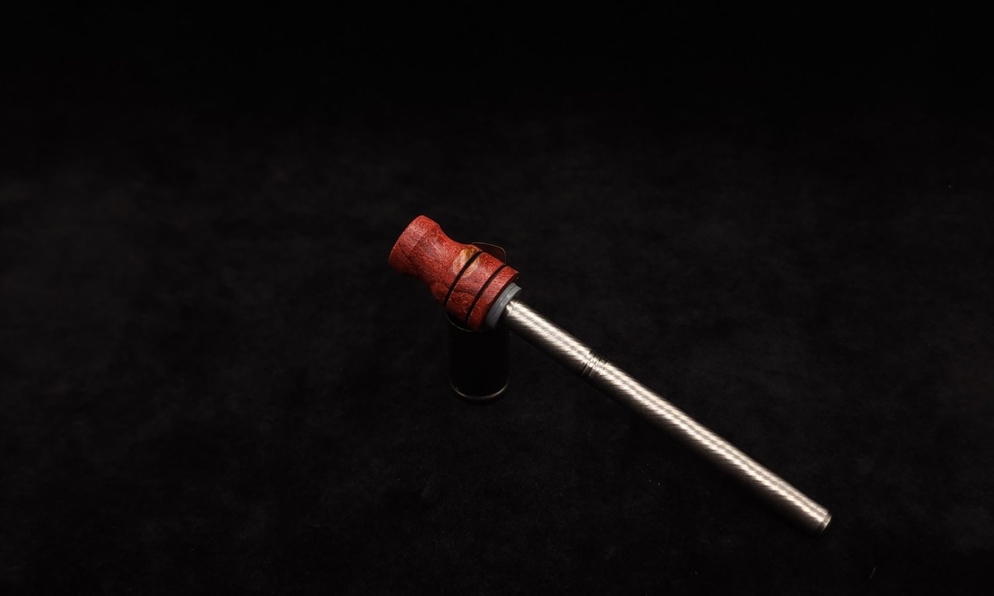 This image portrays Dynavap Spinning Mouthpiece-Mappa Burl/Red by Dovetail Woodwork.