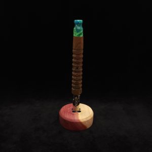 This image portrays DynaPuck-Aromatic Cedar Wood-Dynavap Stem Display by Dovetail Woodwork.