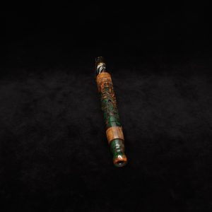 This image portrays Fractured Dynavap XL Hybrid Luminescent Stem + Matching Mouthpiece by Dovetail Woodwork.