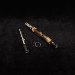 This image portrays Attenuated Dynavap XL Burl Hybrid Stem + Matching Mouthpiece by Dovetail Woodwork.
