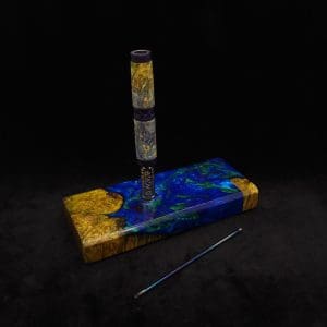 This image portrays Dynavap Device/Material Storage Case-Cosmic Burl (XL) Hybrid by Dovetail Woodwork.