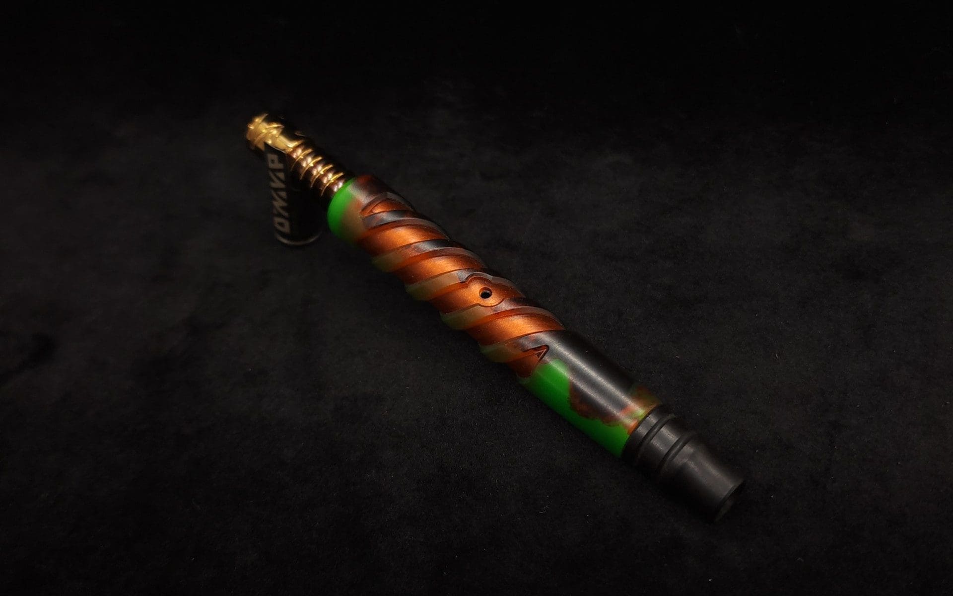 This image portrays Double Helix Dynavap XL Stem + High Class Ebony M.P.- Luminescent Halloween Special!-NEW by Dovetail Woodwork.