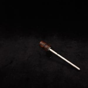 This image portrays Dynavap Spinning Mouthpiece-High Class M.P.- Cocobolo Burl by Dovetail Woodwork.