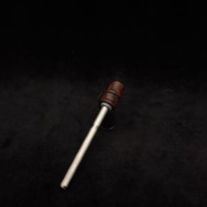This image portrays Dynavap Spinning Mouthpiece-High Class M.P.- Cocobolo Burl by Dovetail Woodwork.