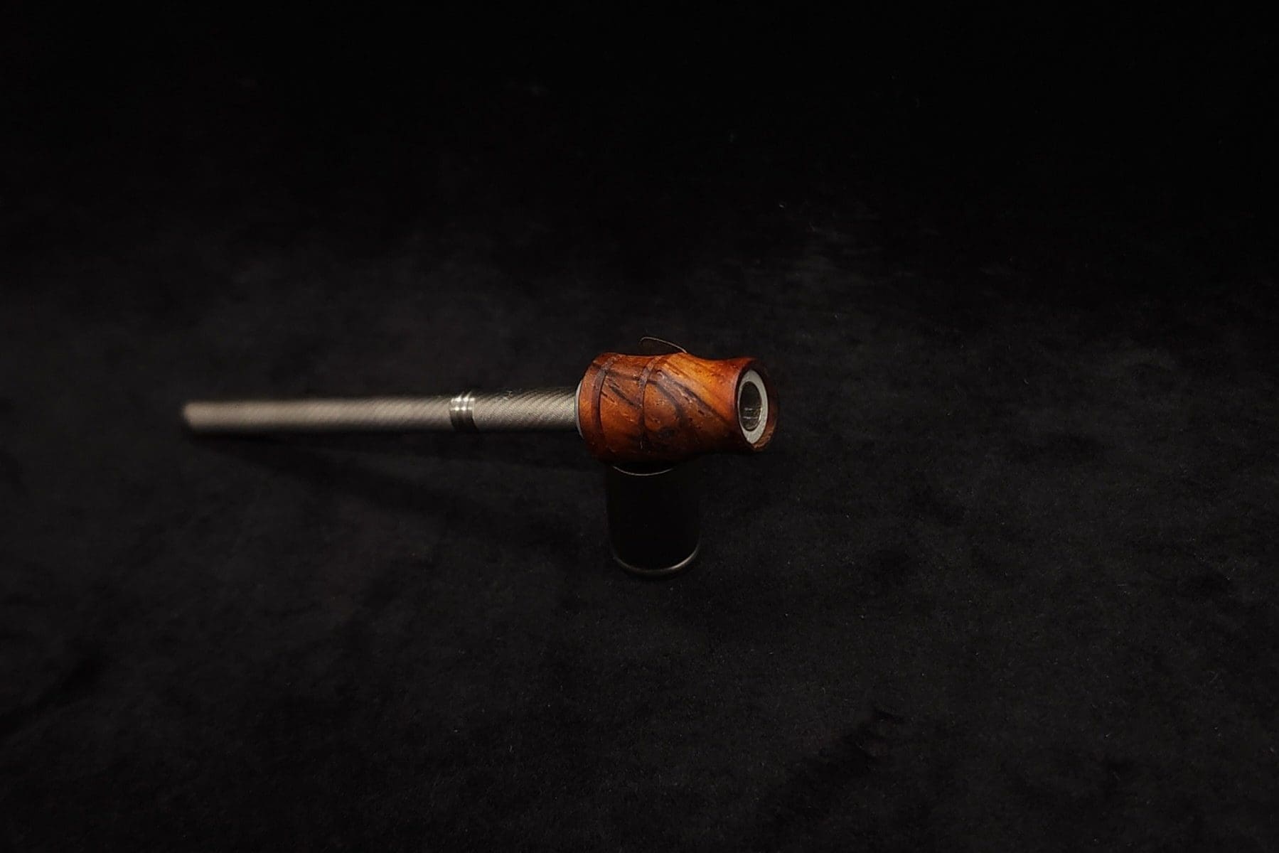 This image portrays Dynavap Spinning Mouthpiece-High Class M.P.- Cocobolo Burl by Dovetail Woodwork.