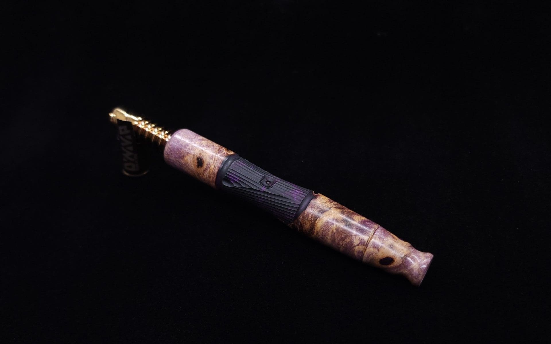 This image portrays Tri-Axial XL Buckeye Burl Hybrid Dynavap Stem + Book-Matched M.P. - NEW DESIGN! by Dovetail Woodwork.