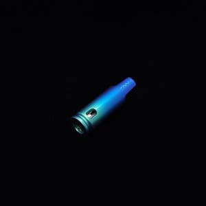 This image portrays The Dynavap Thermal Hyper Cap/Custom Anodized Green-Blue Fade by Dovetail Woodwork.