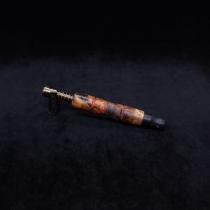 This image portrays Tri-Axial (Standard) Amboyna Burl Dynavap Stem + Matched M.P. - NEW! by Dovetail Woodwork.