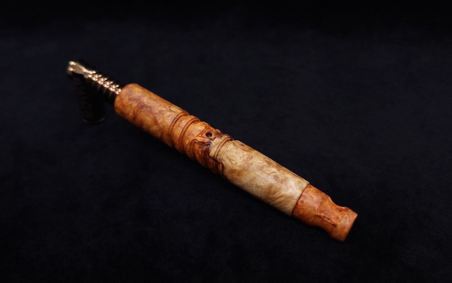 This image portrays Viper XL Stem Dynavap Midsection + Book-Matched M.P. - Exhibition Grade Amboyna Burl ☘ by Dovetail Woodwork.